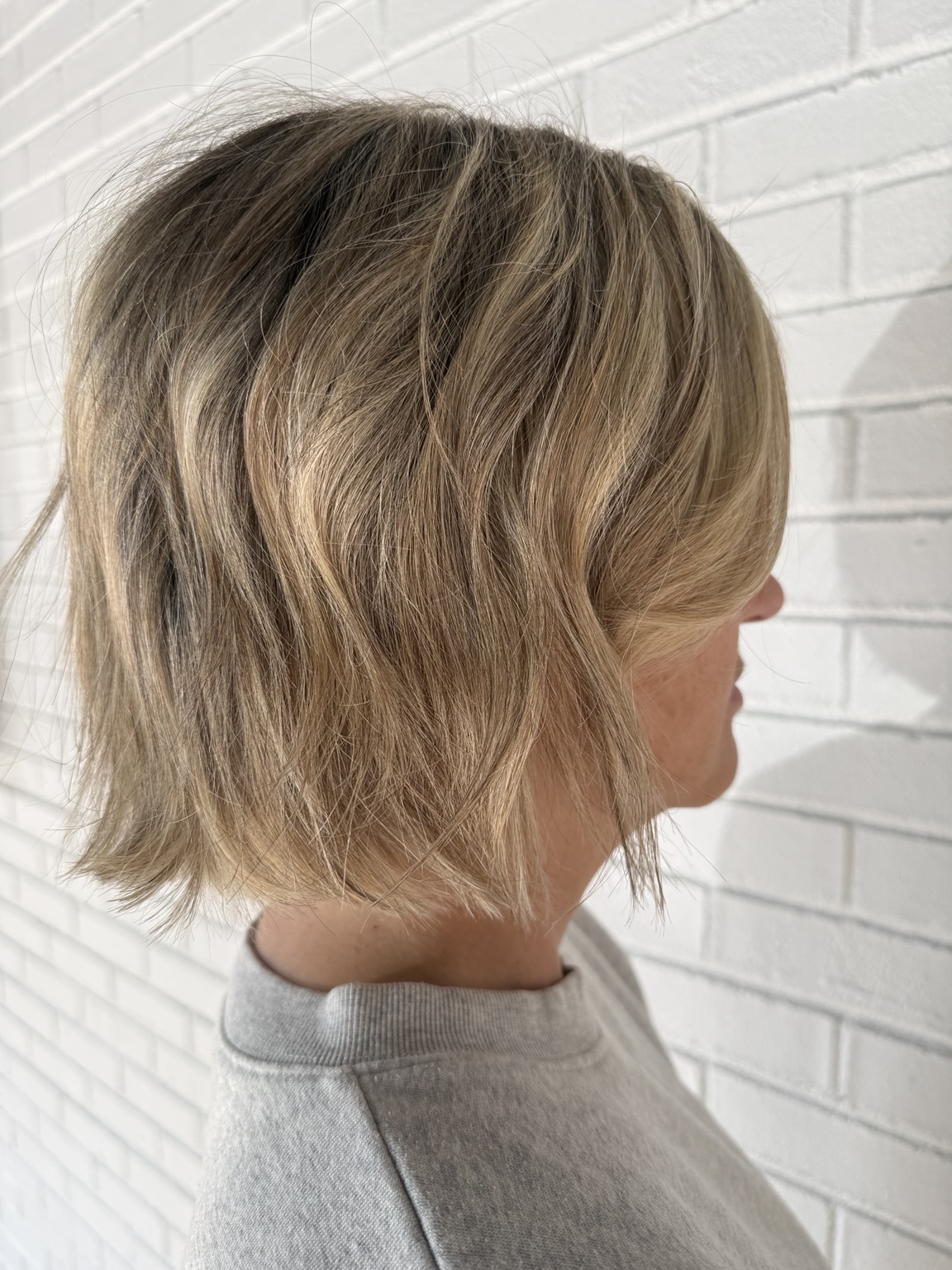 Textured blonde bob haircut and style